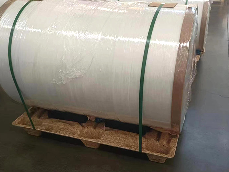 A single pressed wood pallet showing its sturdy, molded construction.