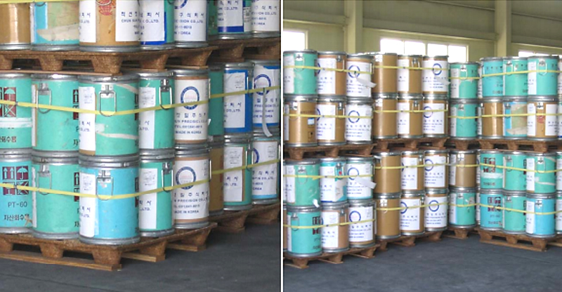 A stack of compressed wood pallets ready for shipping.