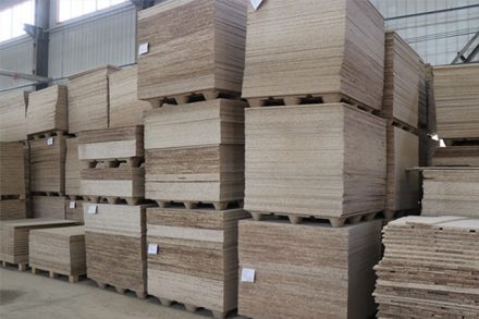 Industrial warehouse storage | Stacks of flooring products on pallets | Large scale logistics for building materials