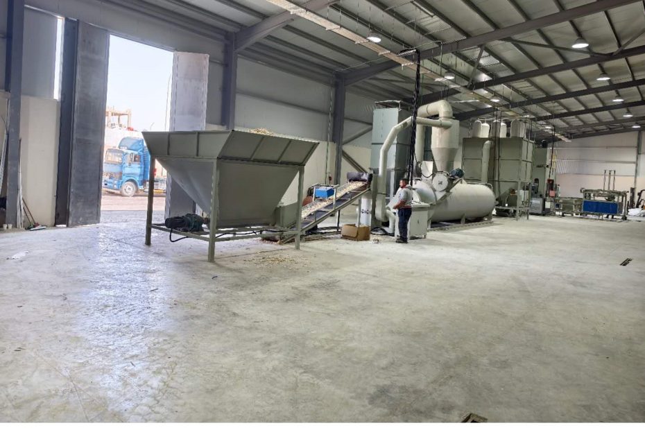 Material preparation area | Wood chip dryer and conveyor system | Essential processing stage in pallet production