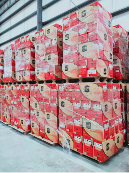 Low-angle shot of stacked pressed wood pallets ID-3029 | High stacking capacity optimizes warehouse space utilization