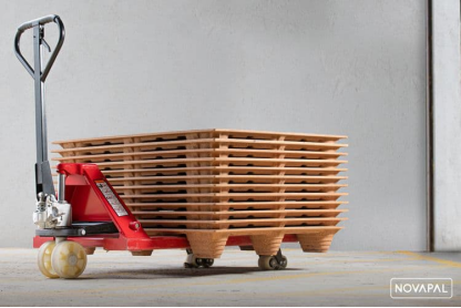 Low-angle shot of stacked pressed wood pallets ID-2991 | High stacking capacity optimizes warehouse space utilization