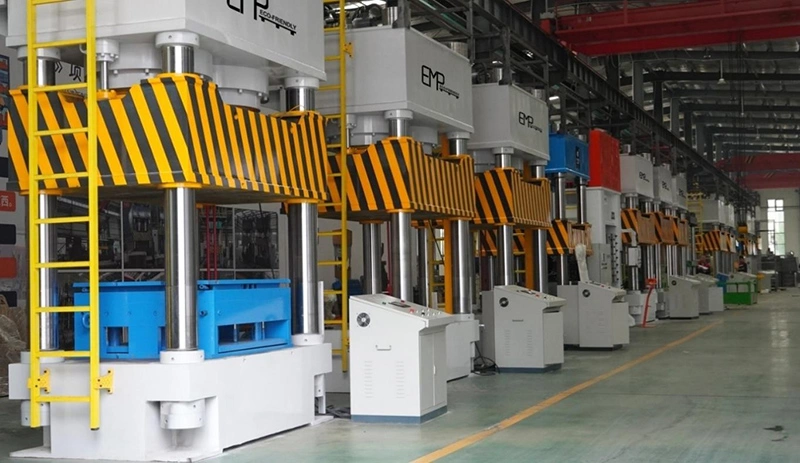 Commercial Wood Pallet Equipment: row of high-tonnage hydraulic presses in an AutoML molded pallet production plant.