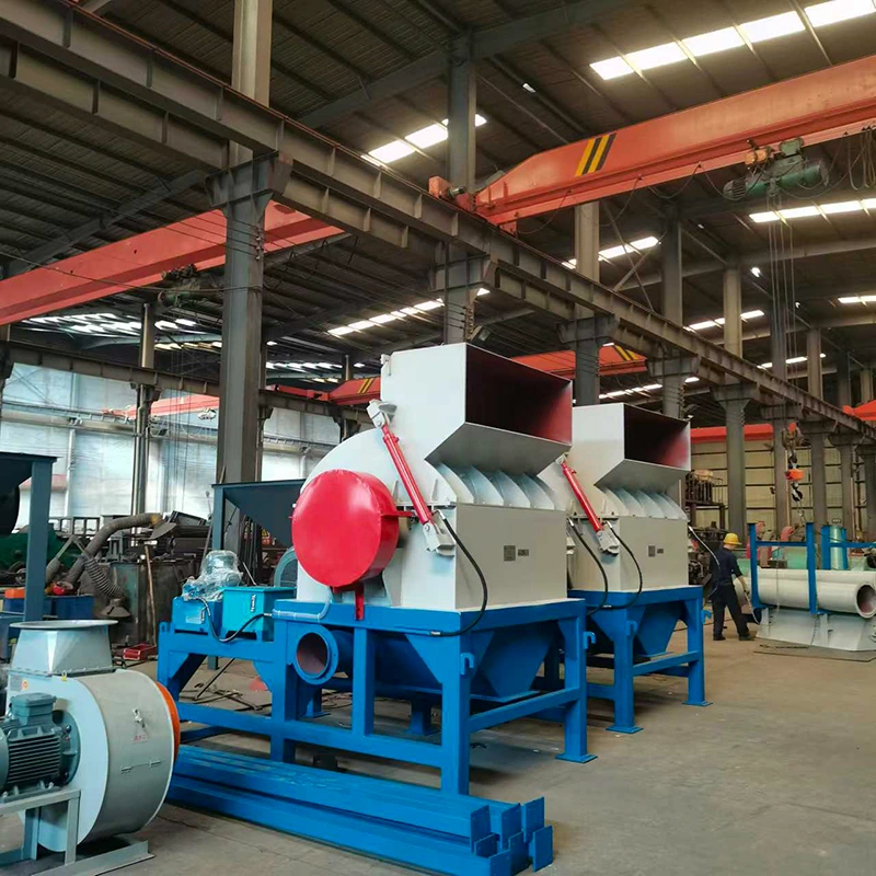 Twin wood pallet crusher units in workshop show continuous by-product crushing capacity.