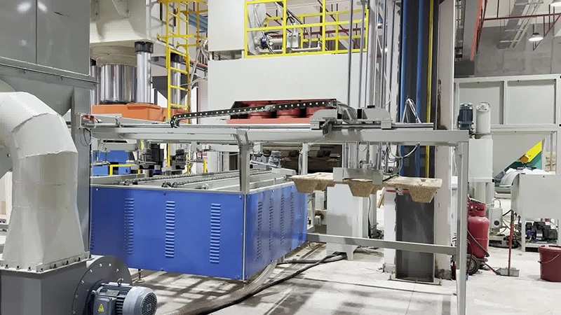 Factory-installed gantry automation unit with steel frame, linear rail drive, and blue sheet-metal enclosure