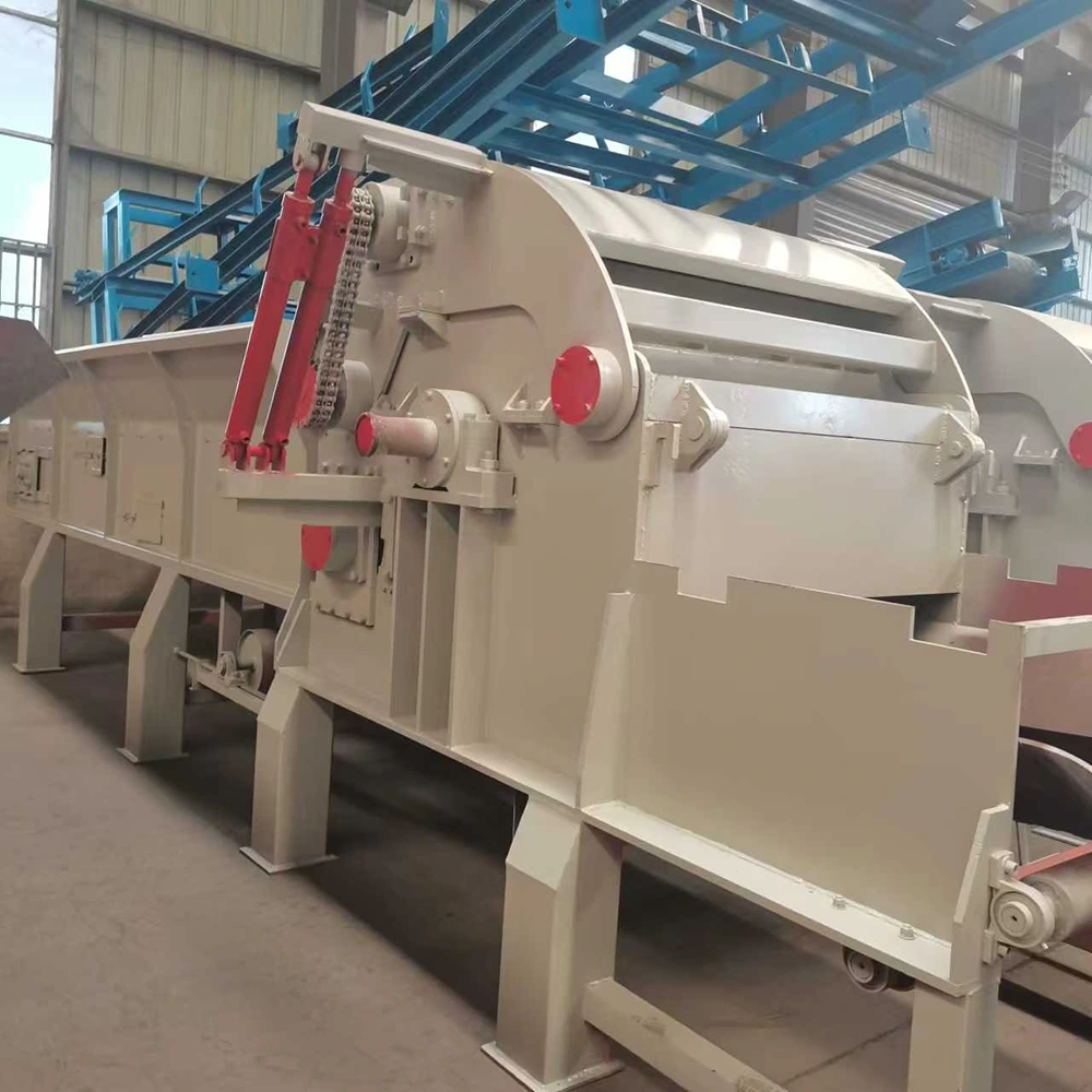 Log chipper welded steel housing for a presswood pallet production line, showing chain drives and bolted side access covers