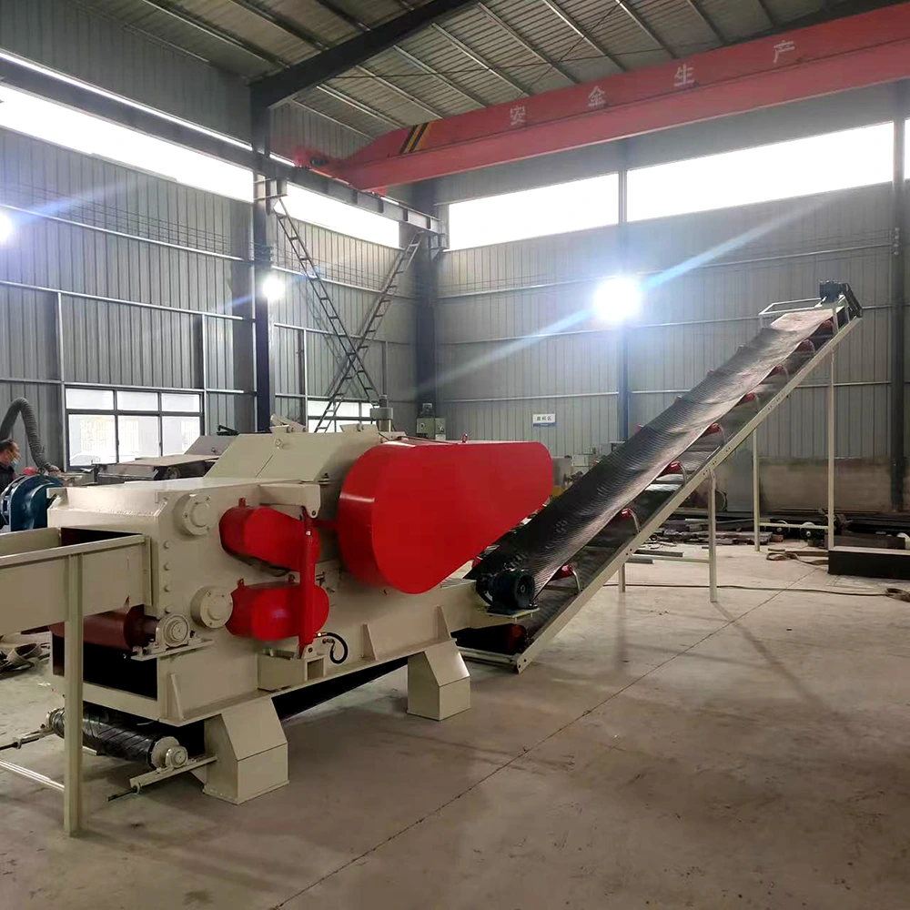 Wood log chipper machine installed at a wood recycling site with inclined discharge conveyor for mixed demolition wood infeed