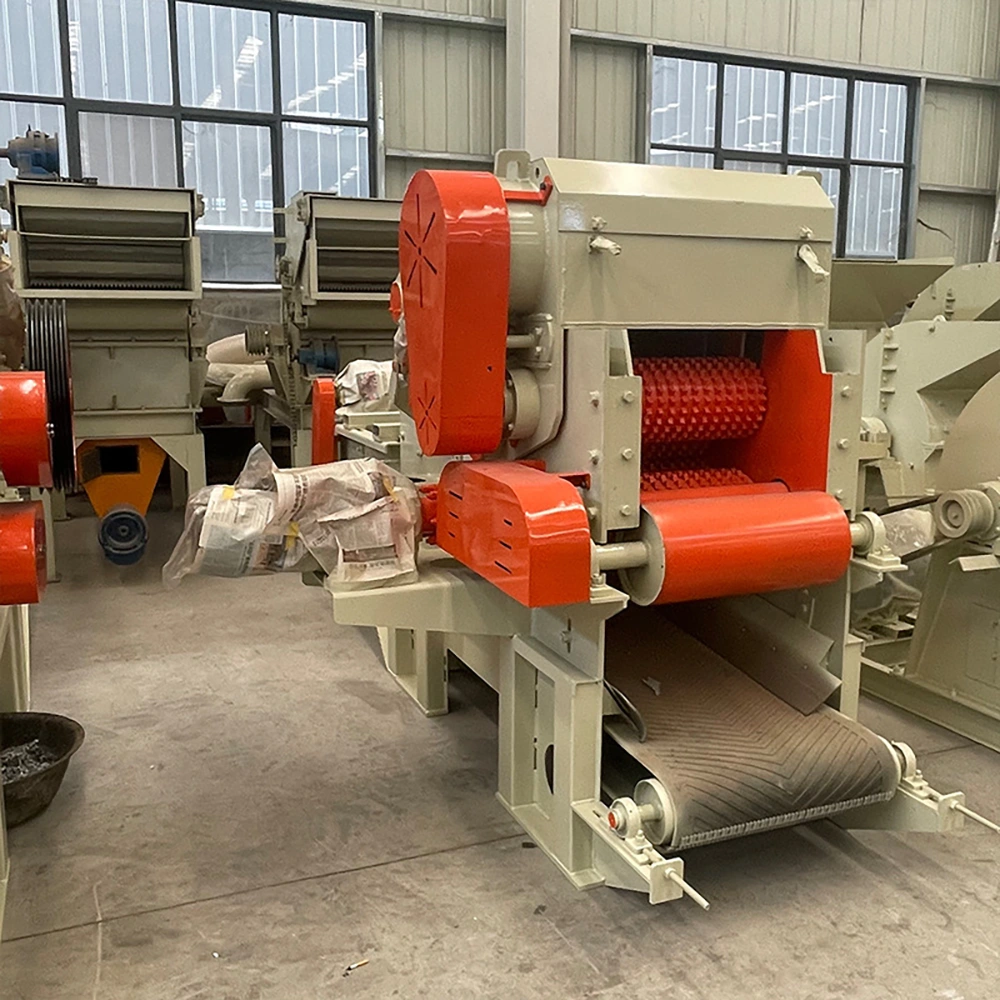 industrial wood chipper knife roller, fly knives and hydraulic feeding system of an EMP drum chipper