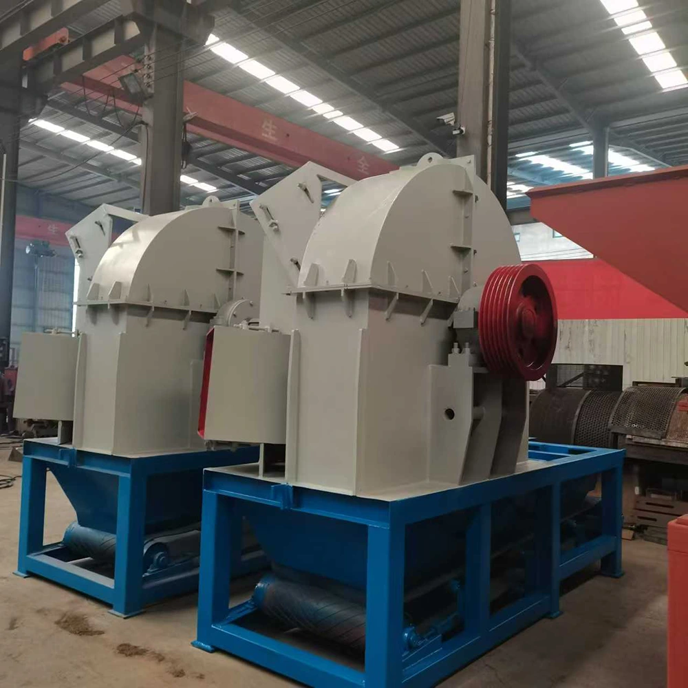 commercial wood chipper feeding a wood pellet production line with mixed wood offcuts and agricultural residue