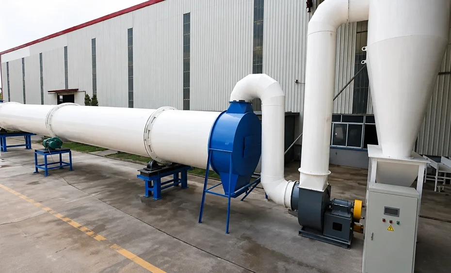Industrial rotary drum dryer with cyclone separator, process ducting, blower, and steel support frames