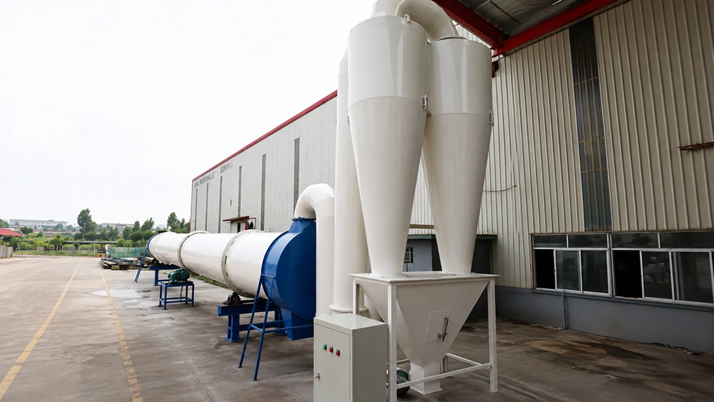 Industrial rotary drum dryer with twin cyclone separators and conical dust collection hopper