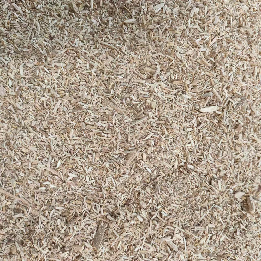BX216 wood chipper output of uniform 30mm wood chips ready for the rotary drum drying stage of a pellet line