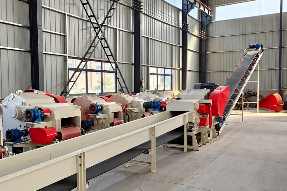 EMP-Shred industrial shredding line with red feed rollers, blue drives, and belt conveyors