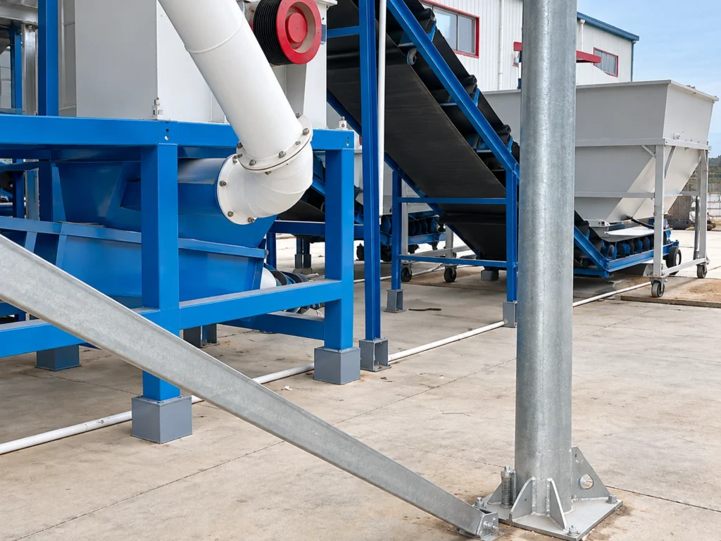 Pulvz wood pulverizer module on a carbon steel frame with flanged ducting, inclined belt conveyor and base plates for anchor bolts on site